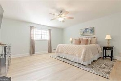 Nestled on a level lot just over half an acre, this beautifully - photo 19