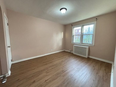 This Well-maintained 2-Family Brick Townhouse is For Sale in - photo 9