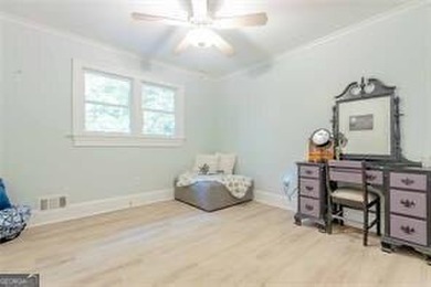 Nestled on a level lot just over half an acre, this beautifully - photo 28