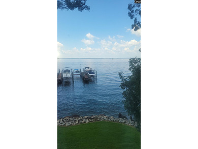 PRICE REDUCED...WELCOME TO SPENCES POINT ON LAKE MURRAY. Proud - photo 3
