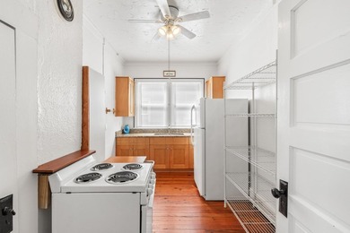 Welcome to this charming multi-family home nestled in the heart - photo 33