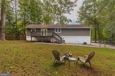 Nestled on a level lot just over half an acre, this beautifully - photo 37