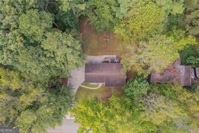 Nestled on a level lot just over half an acre, this beautifully - photo 39