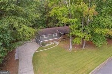 Nestled on a level lot just over half an acre, this beautifully - photo 40