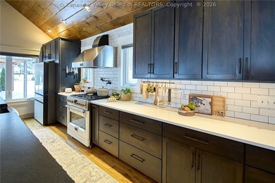 This exceptional 22-acre property blends luxury, craftsmanship - photo 13
