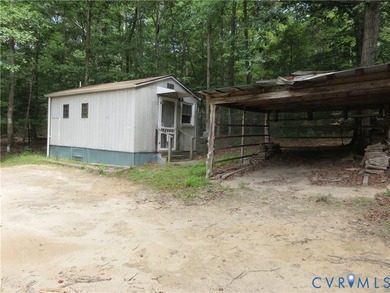 Tucked away on 5 peaceful acres, with a front porch view of the - photo 37