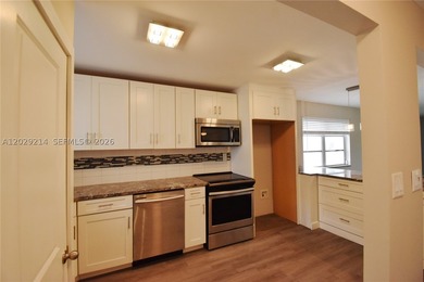 Move in ready 2-bedroom 2 bath condo offers a modern kitchen - photo 3