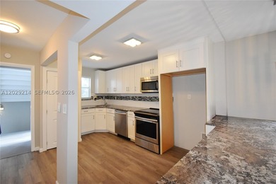 Move in ready 2-bedroom 2 bath condo offers a modern kitchen - photo 4