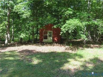 Tucked away on 5 peaceful acres, with a front porch view of the - photo 46