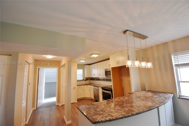Move in ready 2-bedroom 2 bath condo offers a modern kitchen - photo 7