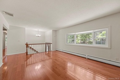 Tucked away on a beautifully wooded and private lot, this - photo 6