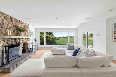 Nestled along the waterfront in East Quogue, 50 Sunset Avenue - photo 11