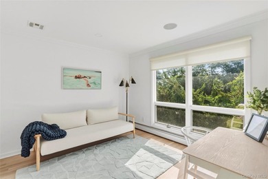 Nestled along the waterfront in East Quogue, 50 Sunset Avenue - photo 14