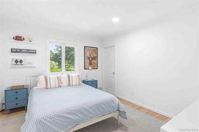 Nestled along the waterfront in East Quogue, 50 Sunset Avenue - photo 16