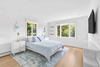 Nestled along the waterfront in East Quogue, 50 Sunset Avenue - photo 19