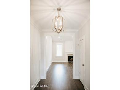 DON'T MISS $10,000 BUYER INCENTIVES! Situated in the highly - photo 3
