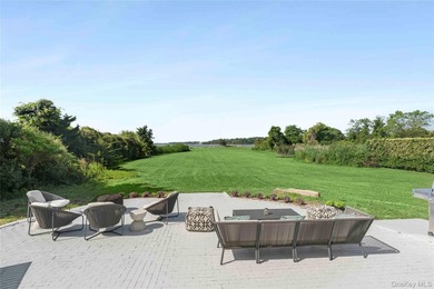 Nestled along the waterfront in East Quogue, 50 Sunset Avenue - photo 25