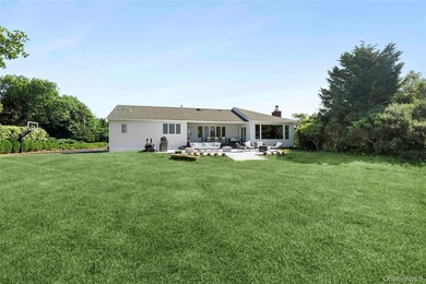 Nestled along the waterfront in East Quogue, 50 Sunset Avenue - photo 26