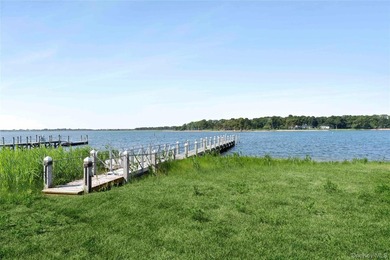 Nestled along the waterfront in East Quogue, 50 Sunset Avenue - photo 27