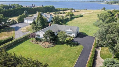 Nestled along the waterfront in East Quogue, 50 Sunset Avenue - photo 29