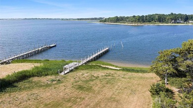 Nestled along the waterfront in East Quogue, 50 Sunset Avenue - photo 31