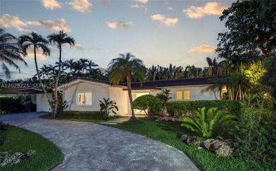 Discover this captivating residence at 145 S Prospect Dr, Miami - photo 1