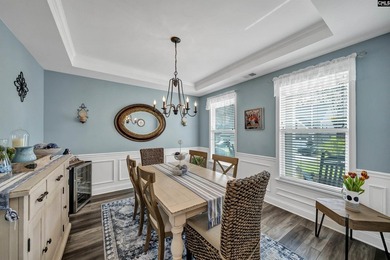 Drive your golf cart to the lake from this beautiful 3Br, 2 1/2