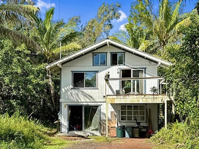 Welcome to this charming redwood and cedar home nestled in the - photo 1
