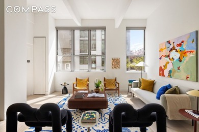 Welcome home to residence 2E at 338 Berry Street, a former - photo 1