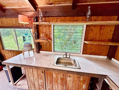 Welcome to this charming redwood and cedar home nestled in the - photo 5