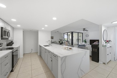 The waterfront views of this penthouse level Lakeside - photo 11