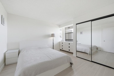 The waterfront views of this penthouse level Lakeside - photo 15