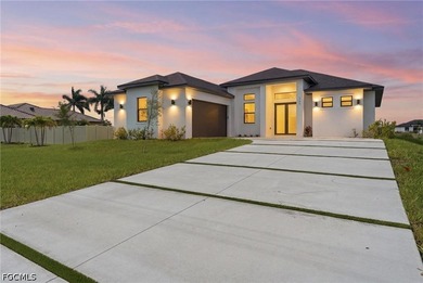 Experience contemporary waterfront living in this beautifully - photo 1