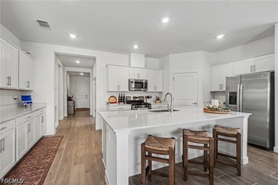Welcome home! This better-than-new Areca model pool and spa home - photo 5