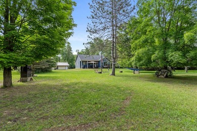 Escape to the beauty of Northern Michigan with this charming - photo 3