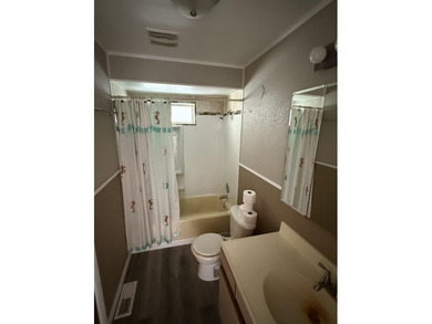 Enjoy peaceful riverfront living in this charming 2-bedroom - photo 12