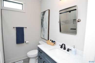 Experience lake living at The Reserve in this beautifully - photo 19