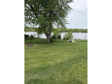 Enjoy peaceful riverfront living in this charming 2-bedroom - photo 20