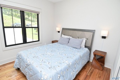 Experience lake living at The Reserve in this beautifully - photo 21