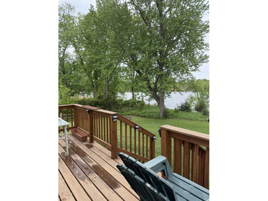 Enjoy peaceful riverfront living in this charming 2-bedroom - photo 22