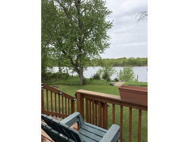 Enjoy peaceful riverfront living in this charming 2-bedroom - photo 24