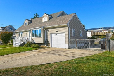 Welcome to 115 Old Farmingdale Road, West Babylon. Charming and - photo 2