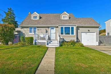 Welcome to 115 Old Farmingdale Road, West Babylon. Charming and - photo 4