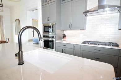 Experience lake living at The Reserve in this beautifully - photo 37