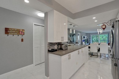 Experience effortless South Florida living in this fully - photo 10