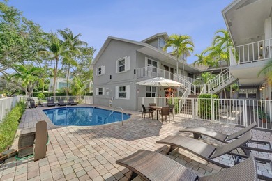RARELY AVAILABLE sophisticated 1st floor residence in the highly - photo 1