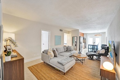 RARELY AVAILABLE sophisticated 1st floor residence in the highly - photo 3