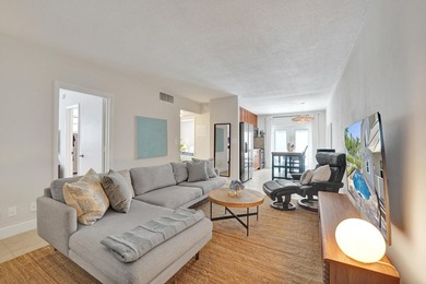 RARELY AVAILABLE sophisticated 1st floor residence in the highly - photo 4