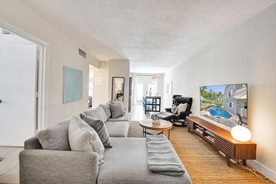 RARELY AVAILABLE sophisticated 1st floor residence in the highly - photo 5