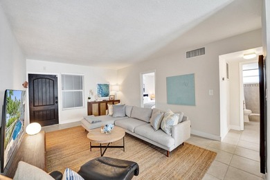 RARELY AVAILABLE sophisticated 1st floor residence in the highly - photo 6